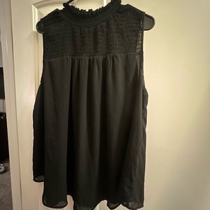 Black sleeveless blouse